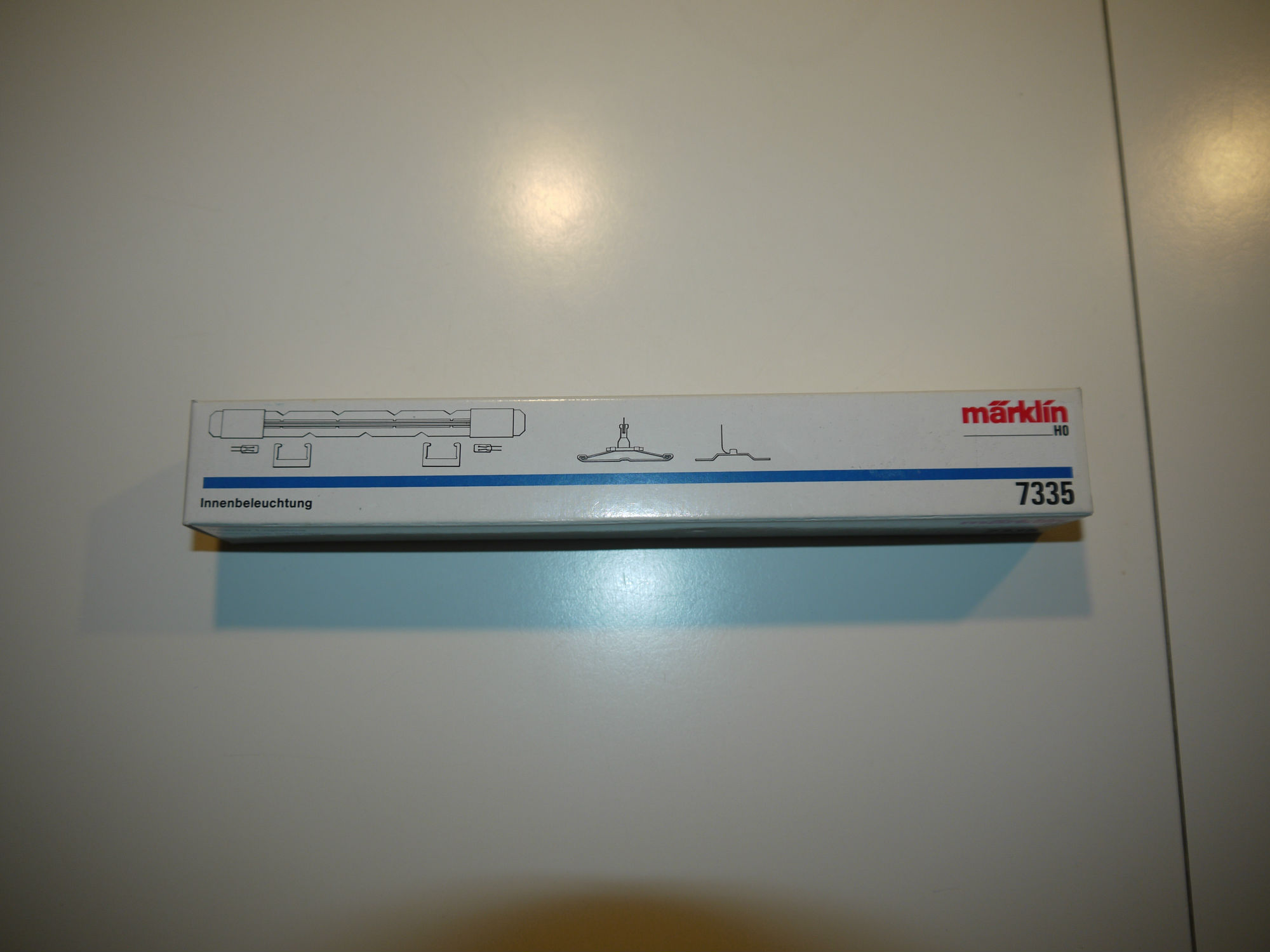 Märklin 7335 Innerbelysning til Personvogn med  slæbesko. Passer til DSB 42761 og 42764 Ny i æske. H0 AC