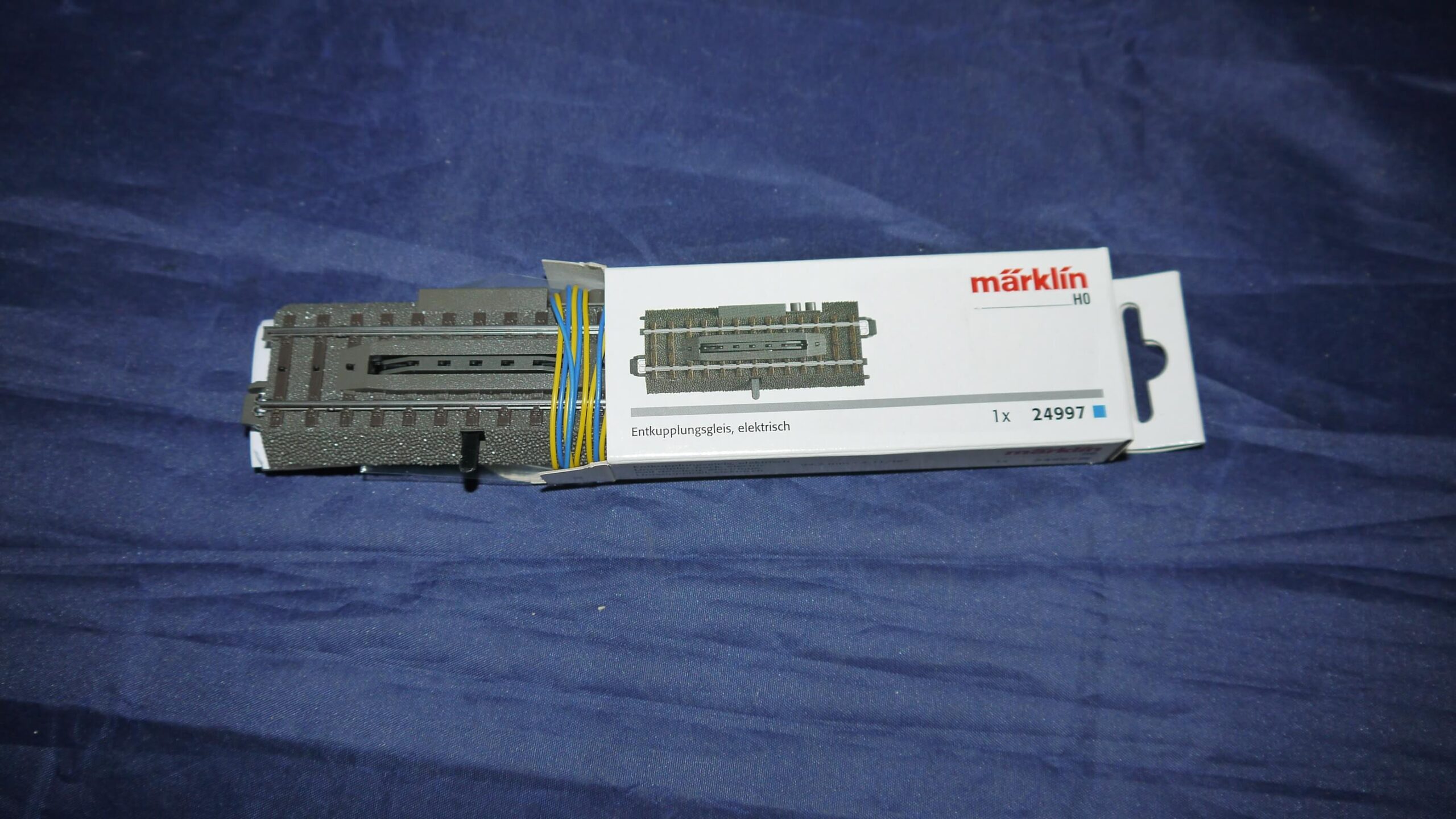 Märklin 24997 El afkoblings skinne Til C skinner Ny i Æske. H0 AC