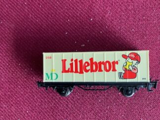 Marklin Lillebror  DSB Vogn Let brugt  gulning på den ene Side. H0.